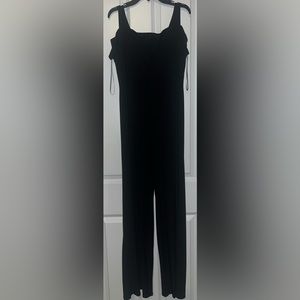 Black off the shoulder jumper. Size 10. Worn once.